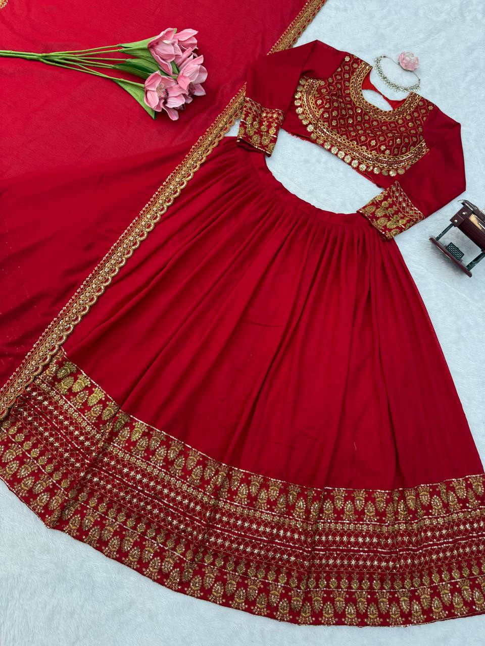 Classic Crimson Red Bridal Lehenga Choli Featuring Opulent Gold Zari Embroidery and Scalloped Borders